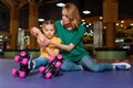 mother cheering up injured daughter