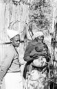 A mother and child attend a rudimentary clinic at Maun 1968