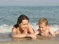 Mother with child on beach Royalty Free Stock Photo