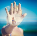 Mother and child on a beach on a womans hand Royalty Free Stock Photo