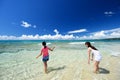 Mother and a child on the beautiful beach Royalty Free Stock Photo