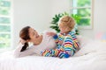 Mother and child in bed. Mom and baby at home Royalty Free Stock Photo