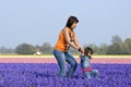 Mother and child in colorful bulb field