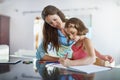 Mother, child and drawing learning in home for art creativity at kitchen counter, development or teaching. Woman Royalty Free Stock Photo