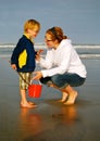 Mother and Child explore Beach Closeup Royalty Free Stock Photo