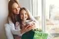 Family sitting at home with presents Royalty Free Stock Photo