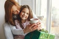 Family sitting at home with presents Royalty Free Stock Photo