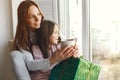 Family sitting at home with presents Royalty Free Stock Photo