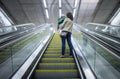 Mother and child getting out of subway station