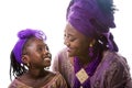 Mother and child girl looking to each other.African traditional clothing