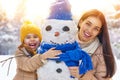 Mother and child girl on a winter walk Royalty Free Stock Photo