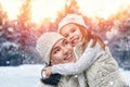Mother and child girl on a winter walk Royalty Free Stock Photo