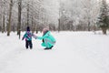 Mother and child girl on a winter walk in nature. Happy family Royalty Free Stock Photo