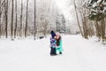 Mother and child girl on a winter walk in nature. Happy family Royalty Free Stock Photo