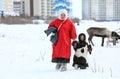 Mother with child go winter day on snow in Nadym Yamalo-Nenets A