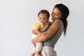 Mother And Child. Happy Young African American Mom Holding Cute Toddler Baby Royalty Free Stock Photo
