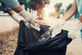 Mother and child help picking up trash