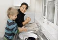 Mother and Child in the kitchen. Royalty Free Stock Photo