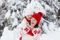 Mother and child in knitted winter hats in snow Royalty Free Stock Photo