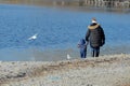 Mother with child at the lake 2