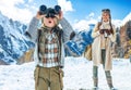 Mother and child looking into distance through binoculars Royalty Free Stock Photo