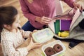 Mother and child packing backpack for the school Royalty Free Stock Photo