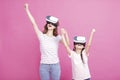 Mother and child playing together with virtual reality headsets Royalty Free Stock Photo