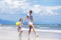 Mother and child on tropical beach. Sea vacation Royalty Free Stock Photo