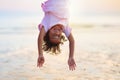 Mother and child playing on tropical beach Royalty Free Stock Photo