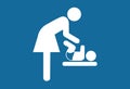 Mother and child room: mother swaddles newborn. Public sign. Mother`s room sign. Mother swaddle baby icon. T