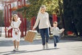 Mother with child with shopping bag in a city Royalty Free Stock Photo