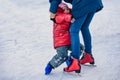 Mother and child skating