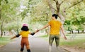 Mother, child and skating with roller skates at nature park for exercise, balance and freedom. Woman and black girl kid Royalty Free Stock Photo