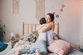 Mother and child son enjoying weekend morning in bed, casual lifestyle Royalty Free Stock Photo