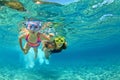 Mother with child swim underwater with fun in sea Royalty Free Stock Photo