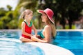 Mother, child at swimming pool. Mom and kid swim Royalty Free Stock Photo