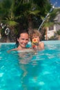 Mother and child in swimming pool Royalty Free Stock Photo