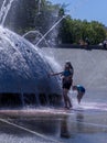 Mother and Child at touching Seattle Fountain