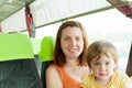 Mother and child traveling in autobus,