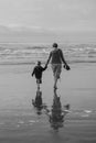 BW Vertical Mother Child Silhouette on Beach