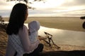 Mother and child enjoying a beach sunset Royalty Free Stock Photo