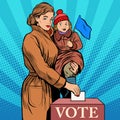 Mother and child women vote in elections