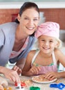 Mother and childing in Kitchen Smiling at Camera Royalty Free Stock Photo