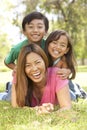 Mother And Children Enjoying Day In Park Royalty Free Stock Photo