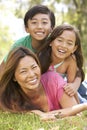 Mother And Children Enjoying Day In Park Royalty Free Stock Photo