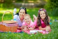 Mother with children enjoying at the picnic Royalty Free Stock Photo