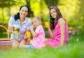 Mother with children enjoying at the picnic Royalty Free Stock Photo