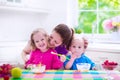 Mother and children having breakfast Royalty Free Stock Photo
