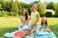 Mother With Children Having Fun In Park. Happy Family Outdoors Royalty Free Stock Photo