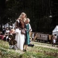 Mother and children medieval Europe. Medieval battle - historical reconstruction.